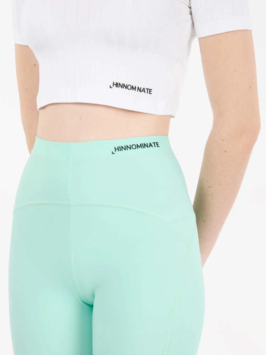 Leggins fitness con cuciture verde